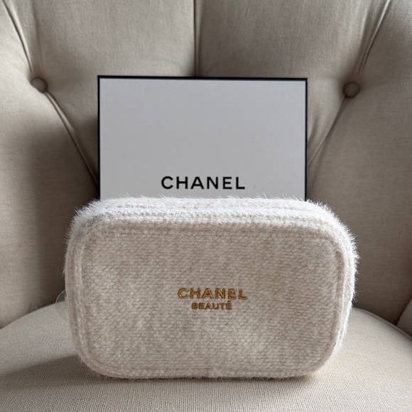 CHANEL Handbags - CHANEL Cream Bouclé Cosmetic Pouch with Gold Logo